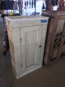 Primitive-style cabinet made from repurposed materials