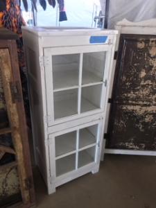 Primitive-style cabinet made from repurposed materials