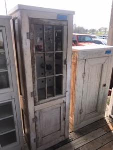 Primitive-style cabinet made from repurposed materials