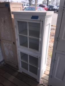 Primitive-style cabinet made from repurposed materials