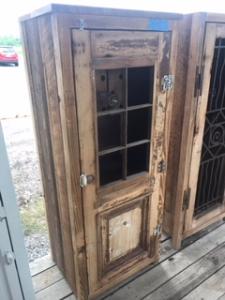 Primitive-style wine cabinet made from repurposed materials