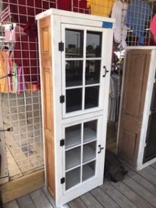 Primitive-style cabinet made from repurposed materials