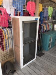 Primitive-style cabinet made from repurposed materials
