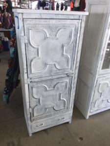 Primitive-style cabinet made from repurposed materials
