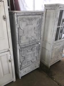 Primitive-style cabinet made from repurposed materials