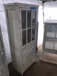 Primitive-style cabinet made from repurposed materials