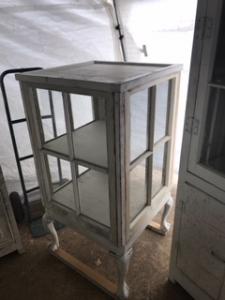 Primitive-style cabinet made from repurposed materials