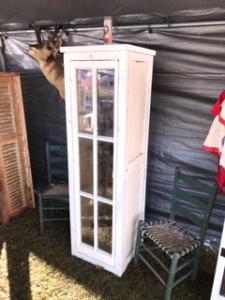 Primitive-style wine cabinet made from repurposed materials