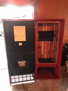 Primitive-style wine cabinet made from an old Coke machine