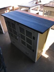 Primitive-style cabinet made from repurposed materials