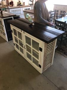 Primitive-style cabinet made from repurposed materials