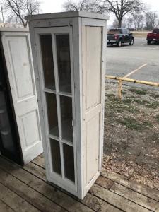 Primitive-style wine cabinet made from an old Coke machine