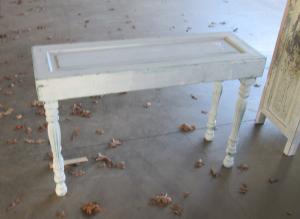 Primitive-style table made from repurposed materials