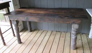 Primitive-style table made from repurposed materials