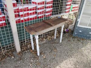 Primitive-style table made from repurposed materials