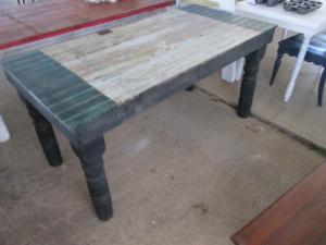 Primitive-style table made from repurposed materials
