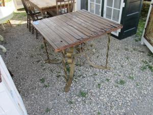 Primitive-style table made from repurposed materials