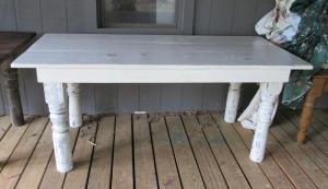 Primitive-style table made from repurposed materials
