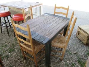 Primitive-style table made from repurposed materials