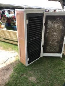 Primitive-style cabinet made from repurposed materials