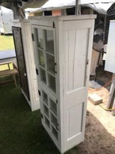 Primitive-style cabinet made from repurposed materials