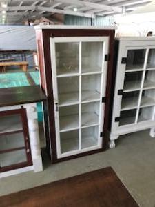 Primitive-style cabinet made from repurposed materials