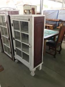 Primitive-style cabinet made from repurposed materials