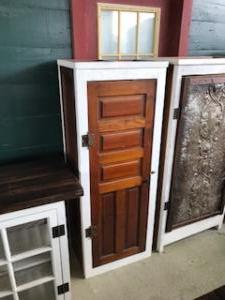 Primitive-style cabinet made from repurposed materials